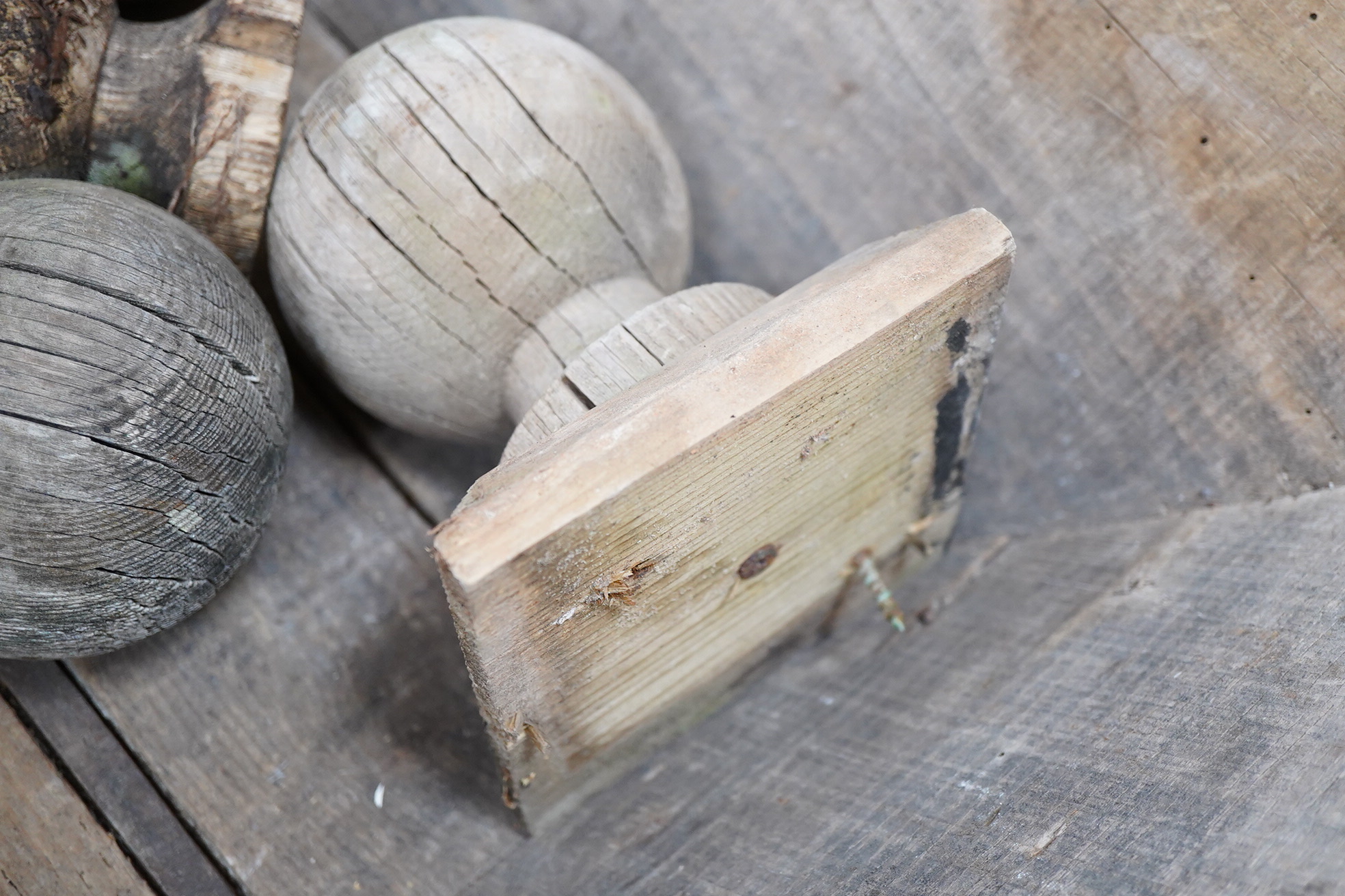 A wood dough bin and various wood finials, largest 77cm